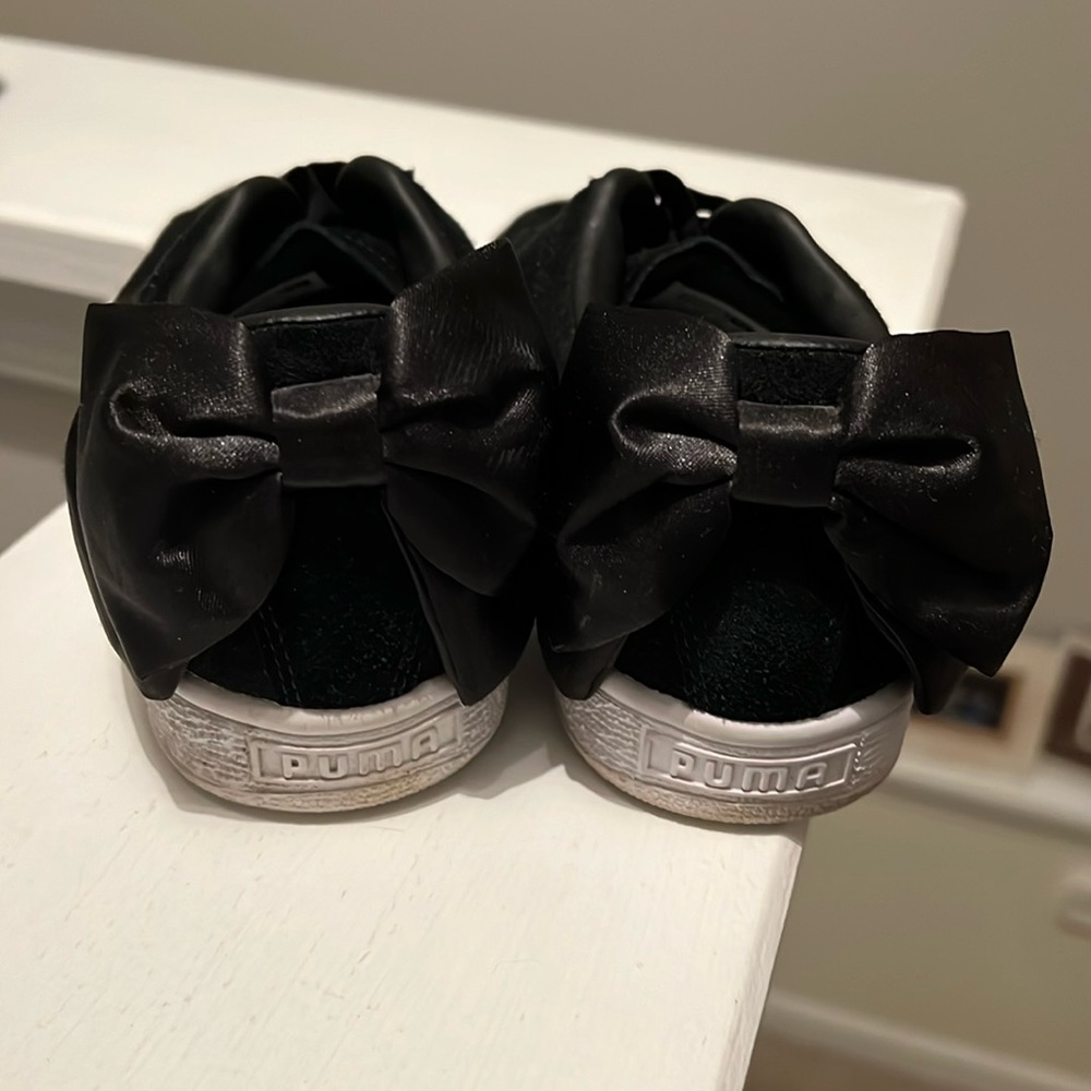 Puma sneakers w satin bow on back.